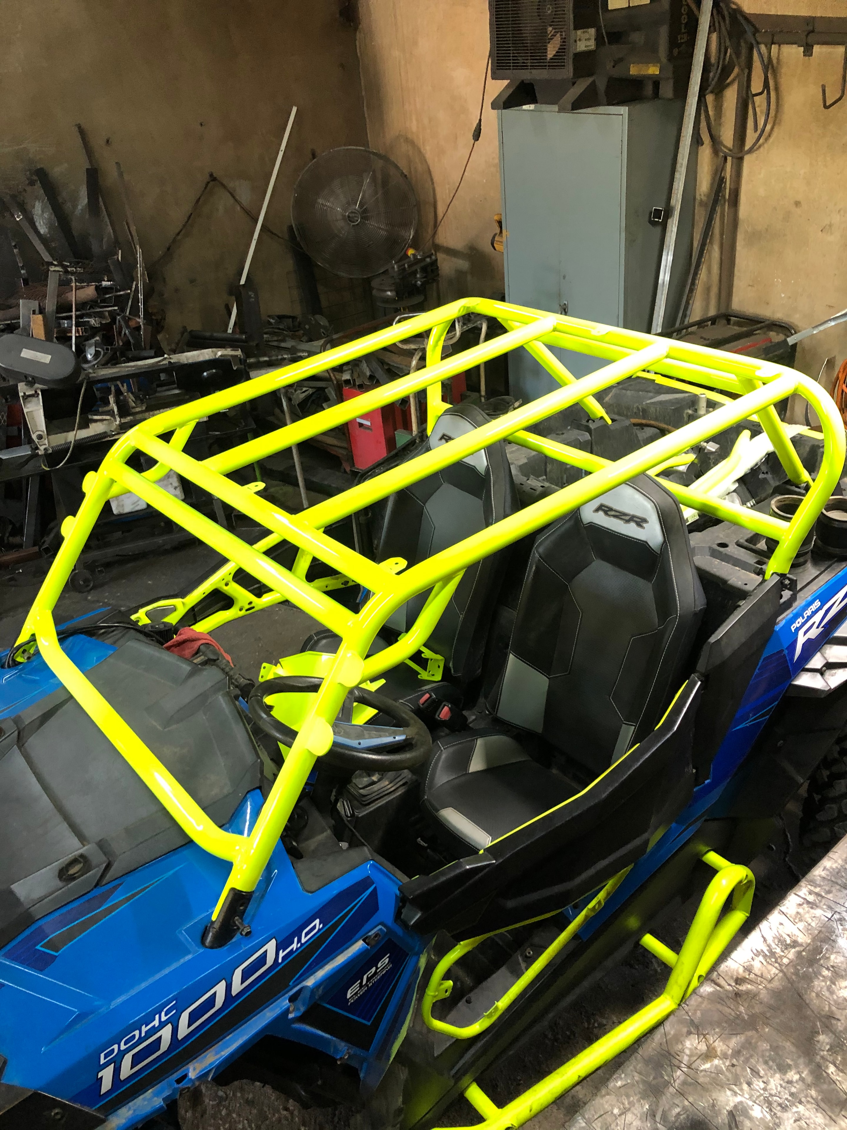 Custom neon yellow roll cage fabrication